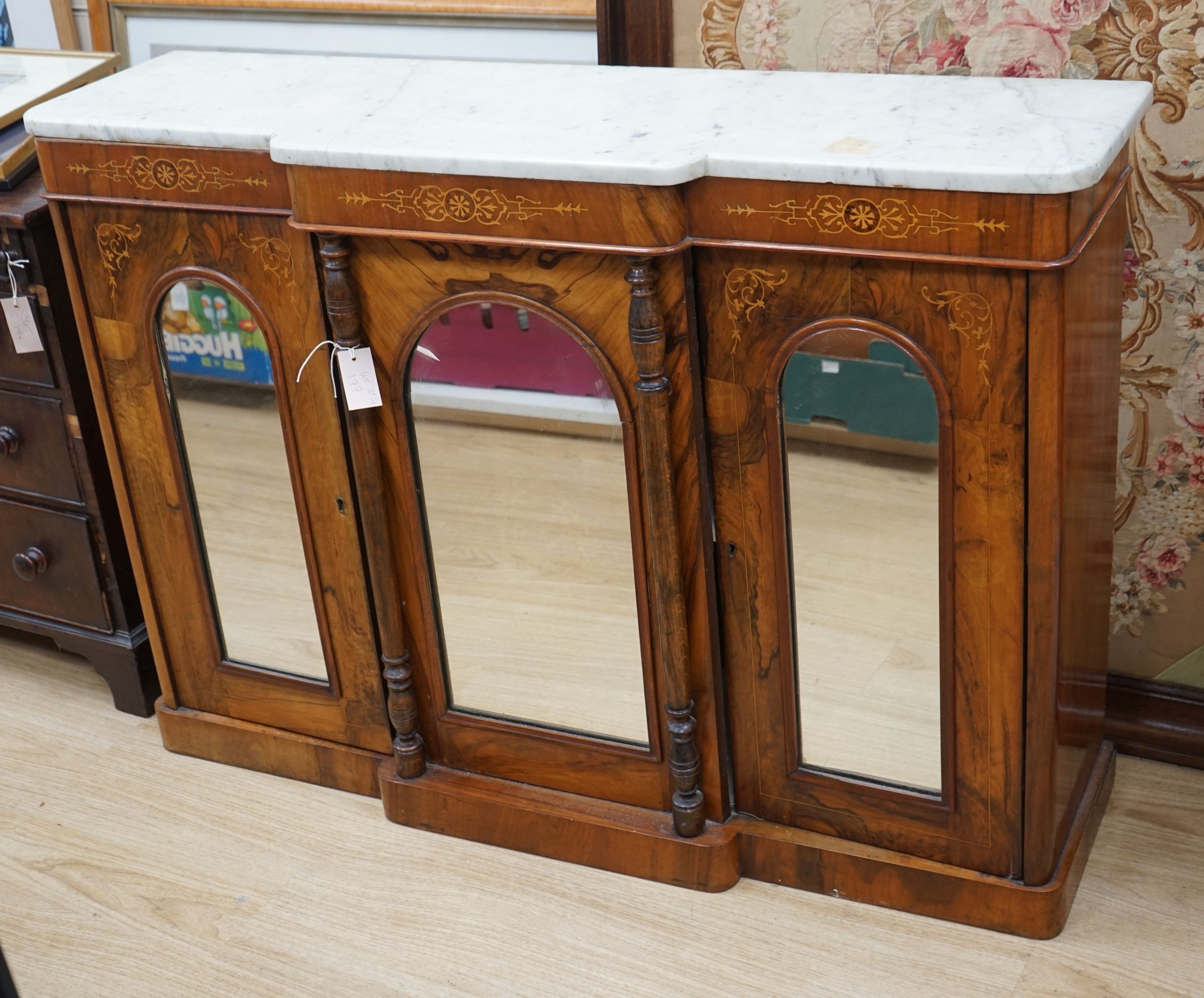 A Victorian inlaid walnut marble top breakfront mirrored side cabinet, width 120cm, depth 34cm, height 84cm